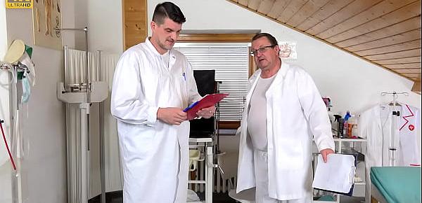 Hot mature brunette Alla Minx made to cum in gyno chair by 2 kinky doctors
